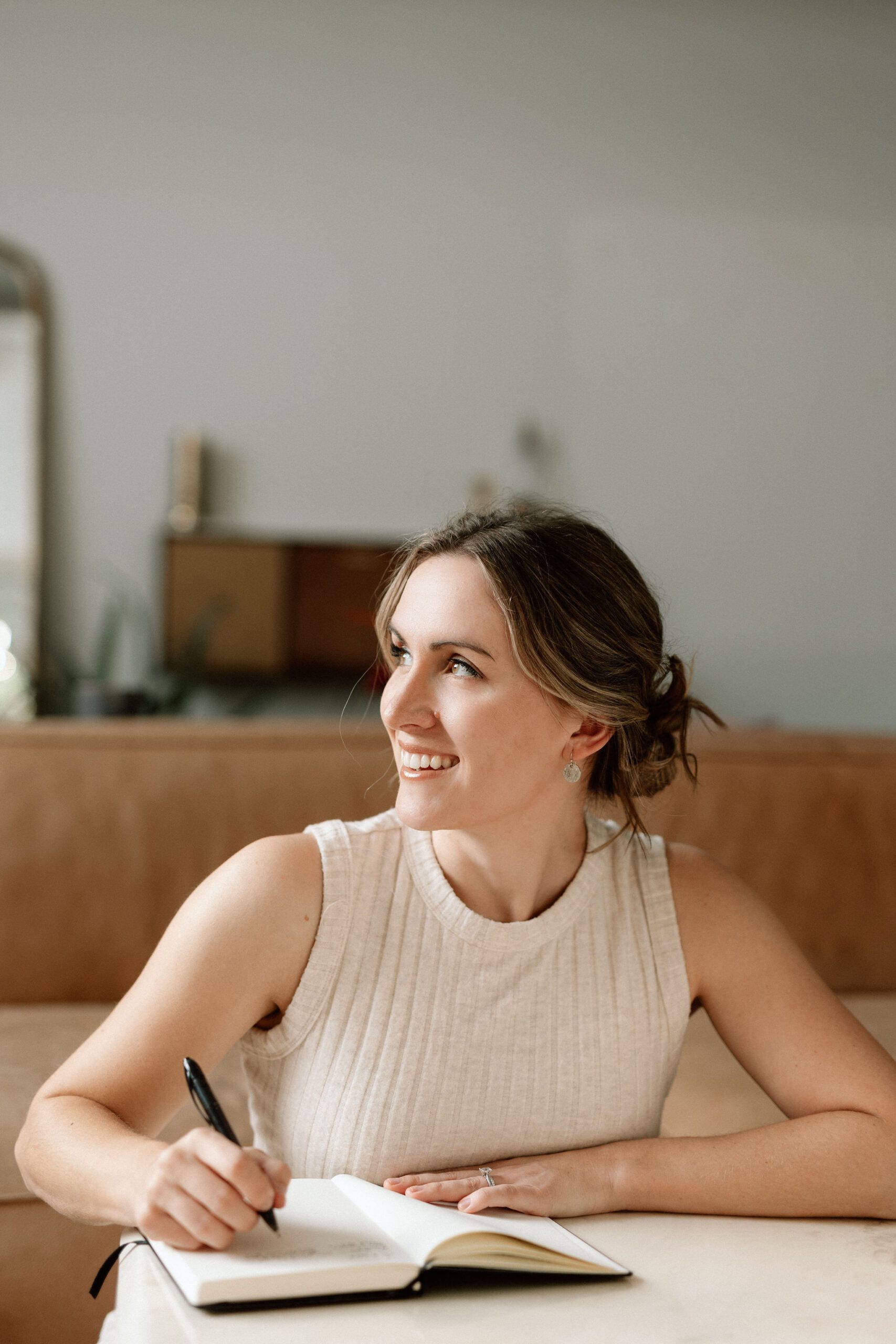 lauren dewey learning specialist look to the left while breaking down how long it takes to create curriculum